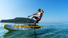 Riding the Tides: Naish Stand-Up Paddle Boarding Experiences
